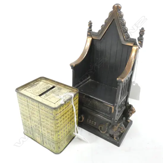 2 OLD MONEY BOXES; 1 TIN COMMONWEALTH SAVING BANK (80X55X90) SOME RUST & CAST IRON 1953 CORONATION THRONE
